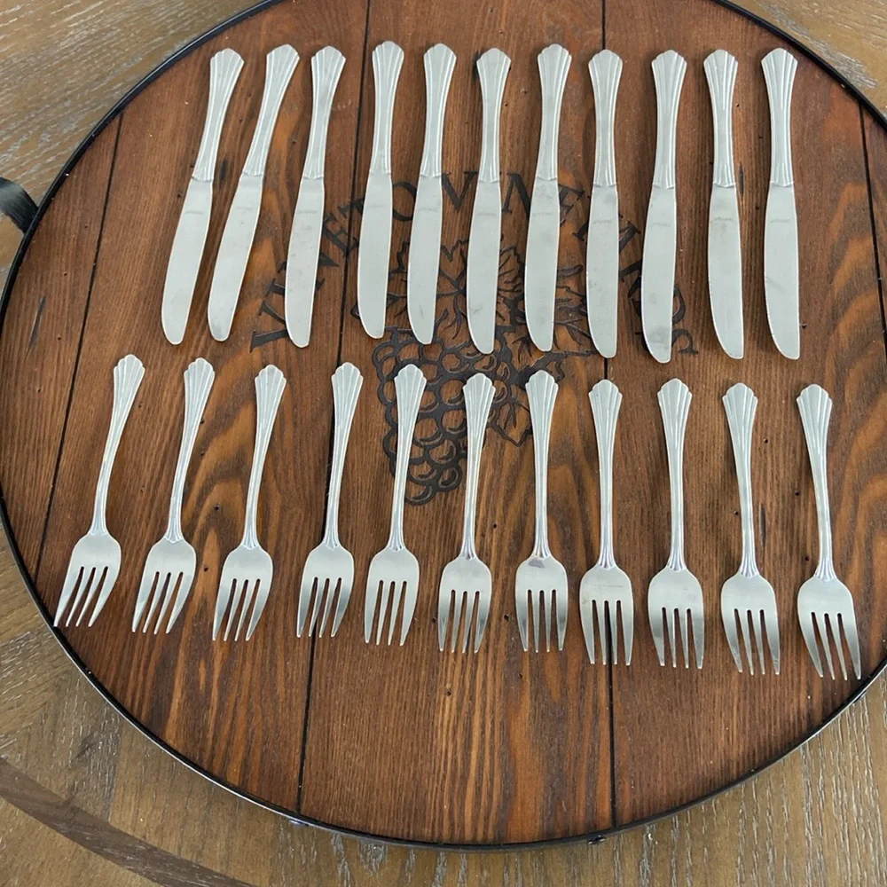 Oneida Stainless Flatware Dinner Knives and Forks set.
